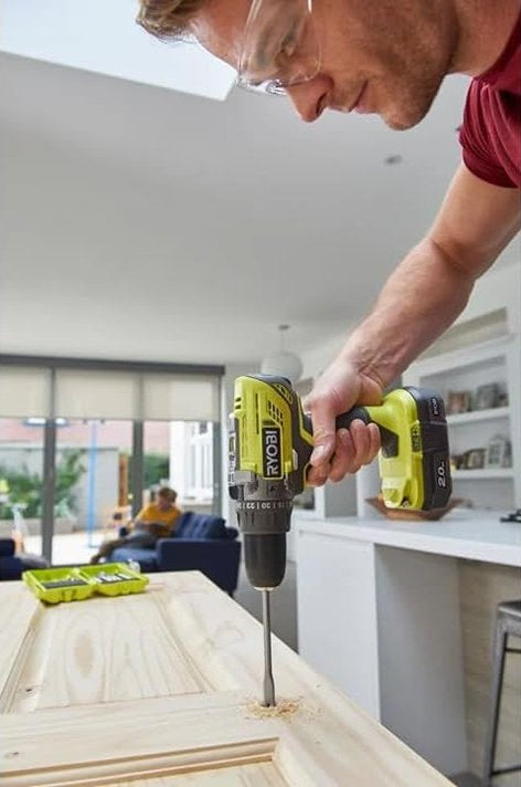 RYOBI Set – udarna aku. bušilica sa 2 baterije (2Ah) i punjačem RYOBI R18PD3-220S